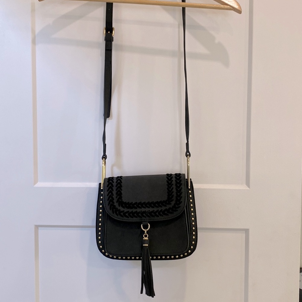 Francesca’s black purse used once